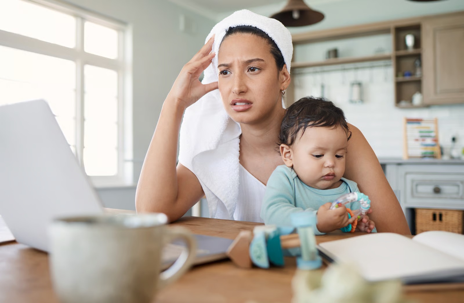 An exhausted mother in Voorhees, NJ feeling the mental load and burnout of parenting.
